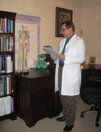 Picture of Dr. Weyrich standing in his office